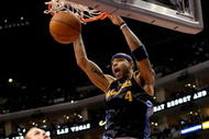 LOS ANGELES - NOVEMBER 20:  Kenyon Martin #4 of the Denver Nuggets dunks over Chris Kaman #35 of the Los Angeles Clippers on November 20, 2009 at Staples Center in Los Angeles, California.     NOTE TO USER: User expressly acknowledges and agrees that, by downloading and/or using this Photograph, user is consenting to the terms and conditions of the Getty Images License Agreement. (Photo by Stephen Dunn/Getty Images)