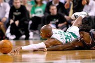 BOSTON, MA - OCTOBER 28: Ray Allen #20 of the Boston Celtics fights for a loose ball with Gerald Wallace #3 of the Charlotte Bobcats at the TD Banknorth Garden on October 28, 2009 in Boston, Massachusetts. NOTE TO USER: User expressly acknowledges and agrees that, by downloading and/or using this Photograph, user is consenting to the terms and conditions of the Getty Images License Agreement. (Photo by Jim Rogash/Getty Images)