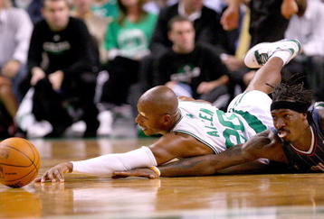 BOSTON, MA - OCTOBER 28: Ray Allen #20 of the Boston Celtics fights for a loose ball with Gerald Wallace #3 of the Charlotte Bobcats at the TD Banknorth Garden on October 28, 2009 in Boston, Massachusetts. NOTE TO USER: User expressly acknowledges and agrees that, by downloading and/or using this Photograph, user is consenting to the terms and conditions of the Getty Images License Agreement. (Photo by Jim Rogash/Getty Images)