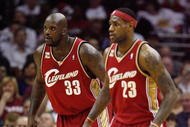 CLEVELAND - OCTOBER 27:  Shaquille O'Neal #33 and LeBron James #23 of the Cleveland Cavaliers wait on defense during the game against the Boston Celtics on October 27, 2009 at Quicken Loans Arena in Cleveland, Ohio.  The Celtics won 95-89.  NOTE TO USER: User expressly acknowledges and agrees that, by downloading and or using this photograph, User is consenting to the terms and conditions of the Getty Images License Agreement. (Photo by Gregory Shamus/Getty Images)