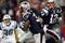 FOXBORO, MA - NOVEMBER 22:  Tom Brady #12 of the New England Patriots hands the ball off to Laurence Maroney #39 in the third quarter against against the New York Jets on November 22, 2009 at Gillette Stadium in Foxboro, Massachusetts. The Patriots defeated the Jets 31-14.  (Photo by Elsa/Getty Images)