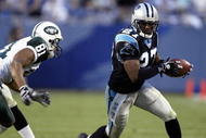 CHARLOTTE, NC - NOVEMBER 13:  Marlon McCree #27 of the Carolina Panthers carries the ball during the game with the New York Jets at Bank of America Stadium on November 13, 2005 in Charlotte, North Carolina. The Panthers won 30-3. (Photo by Craig Jones/Getty Images)