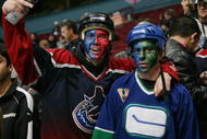 VANCOUVER, CANADA - JANUARY 5:  Vancouver Canucks fans show their support during the NHL game against the Edmonton Oilers on January 5, 2007 at General Motors Place in Vancouver, Canada. Vancouver defeated Edmonton 3-2.  (Photo by: Jeff Vinnick/Getty Images)