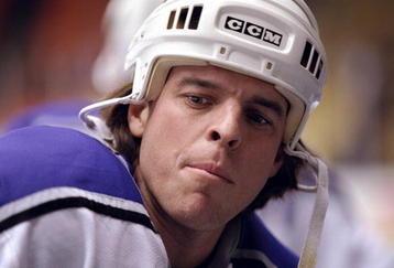 15 Feb 1999:  Russ Courtnall #19 of the  Los Angeles Kings looks on during the game against the Anaheim Mighty Ducks at the Great Western Forum in Inglewood, California. The Ducks defeated the Kings 3-1. Mandatory Credit: Kellie Landis  /Allsport