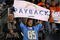 DENVER - NOVEMBER 22:  Fans of the San Diego Chargers support their team against the Denver Broncos during NFL action at Invesco Field at Mile High on November 22, 2009 in Denver, Colorado. The Chargers defeated the Broncos 32-3.  (Photo by Doug Pensinger/Getty Images)