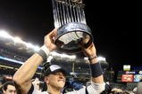 NEW YORK - NOVEMBER 04:  Alex Rodriguez #13 of the New York Yankees celebrates with the trophy after their 7-3 win  against the Philadelphia Phillies in Game Six of the 2009 MLB World Series at Yankee Stadium on November 4, 2009 in the Bronx borough of New York City.  (Photo by Jed Jacobsohn/Getty Images)