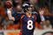DENVER - NOVEMBER 26:  Quarterback Kyle Orton #8 of the Denver Broncos delivers a pass against the New York Giants during NFL action at Invesco Field at Mile High on November 26, 2009 in Denver, Colorado.  (Photo by Doug Pensinger/Getty Images)