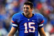 GAINESVILLE, FL - NOVEMBER 28:  Tim Tebow #15 of the Florida Gators smiles after a defensive stop during the game against the Florida State Seminoles at Ben Hill Griffin Stadium on November 28, 2009 in Gainesville, Florida.  (Photo by Sam Greenwood/Getty Images)