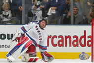 TORONTO - DECEMBER 16:  Henrik Lundqvist #30 of the New York Rangers tries to collect himself after losing his helmet while giving up the 5th goal of the game scored by the Toronto Maple Leafs during their NHL game at the Air Canada Centre on December 16, 2006 in Toronto, Ontario, Canada.  (Photo By Dave Sandford/Getty Images)
