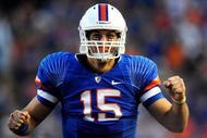 GAINESVILLE, FL - NOVEMBER 28:  Tim Tebow #15 of the Florida Gators celebrates after throwing a touchdown pass during the game against the Florida State Seminoles at Ben Hill Griffin Stadium on November 28, 2009 in Gainesville, Florida.  (Photo by Sam Greenwood/Getty Images)
