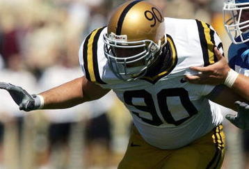 WEST LAFAYETTE, IN - SEPTEMBER 02:  Ryan Baker #90 of the Purdue Boilermakers rushes past the block attempt of Jack Byrne #77 of the Indiana State Sycamores on September 2, 2006 at Ross-Ade Stadium in West Lafayette, Indiana.  (Photo by Jonathan Daniel/Getty Images)