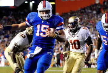 GAINESVILLE, FL - NOVEMBER 28:  Tim Tebow #15 of the Florida Gators runs for a touchdown during the game against the Florida State Seminoles at Ben Hill Griffin Stadium on November 28, 2009 in Gainesville, Florida.  (Photo by Sam Greenwood/Getty Images)