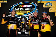 HOMESTEAD, FL - NOVEMBER 20:  (L-R) Team owner Kevin Harvick, driver Ron Hornaday Jr., driver of the #33 VFW.org Chevrolet, and crew chief Rick Ren, celebrate winning the series title in Victory Lane after finishing 8th in the NASCAR Camping World Truck Series Ford 200 at Homestead-Miami Speedway on November 20, 2009 in Homestead, Florida.  (Photo by Rusty Jarrett/Getty Images for NASCAR)