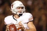 COLLEGE STATION, TX - NOVEMBER 26: Quarterback Colt McCoy #12 of the Texas Longhorns looks to pass the ball downfield against the Texas A&M Aggies in the second half at Kyle Field on November 26, 2009 in College Station, Texas. The Longhorns defeated the Aggies 49-39. (Photo by Aaron M. Sprecher/Getty Images)