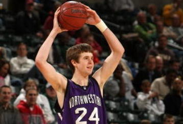 INDIANAPOLIS - MARCH 12:  John Shurna #24 of the Northwestern Wildcats looks to pass the ball against the Minnesota Golden Gophers during the first round of the Big Ten Men's Basketball Tournament at Conseco Fieldhouse on March 12, 2009 in Indianapolis, Indiana.  (Photo by Jonathan Daniel/Getty Images)