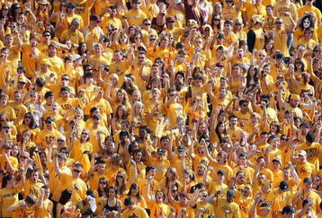 TEMPE, AZ - NOVEMBER 28:  Fans of the Arizona State Sun Devils cheer during the college football game against the Arizona Wildcats at Sun Devil Stadium on November 28, 2009 in Tempe, Arizona. The Wildcats defeated the Sun Devils 20-17. (Photo by Christian Petersen/Getty Images)