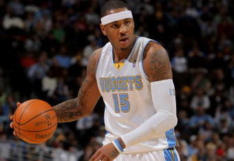 DENVER - OCTOBER 28:  Carmelo Anthony #15 of the Denver Nuggets dribbles the ball upcourt against the Utah Jazz during NBA action at Pepsi Center on October 28, 2009 in Denver, Colorado. The Nuggets defeated the Jazz 114-105.  (Photo by Doug Pensinger/Getty Images)