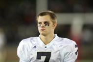 PALO ALTO, CA - NOVEMBER 28:  Jimmy Clausen #7 of the Notre Dame Fighting Irish walks the sidelines during their game against the Stanford Cardinal at Stanford Stadium on November 28, 2009 in Palo Alto, California.  (Photo by Ezra Shaw/Getty Images)