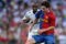 MADRID, SPAIN - MAY 02:  Lionel Messi of Barcelona controls the ball during the La Liga match between Real Madrid and Barcelona at the Santiago Bernabeu Stadium on May 2, 2009 in Madrid, Spain. Barcelona won the match 6-2.  (Photo by Jasper Juinen/Getty Images)
