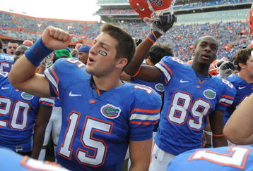 GAINESVILLE, FL - NOVEMBER 21: Quarterback Tim Tebow #15 of the Florida Gators celebrates a 62 - 3 victory  against the Florida International University Golden Panthers, November 21, 2009 at Ben Hill Griffin Stadium in Gainesville, Florida.  (Photo by Al Messerschmidt/Getty Images)