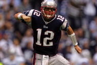 IRVING, TX - OCTOBER 14:  Quarterback Tom Brady #12 of the New England Patriots celebrates a touchdown in the fourth quarter against the Dallas Cowboys at Texas Stadium on October 14, 2007 in Irving, Texas.  (Photo by Ronald Martinez/Getty Images)