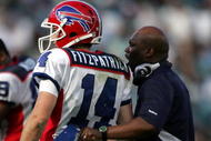 JACKSONVILLE, FL - NOVEMBER 22: Head Coach Perry Fewell and quarterback Ryan Fitzpatrick #14 of the Buffalo Bills watches his team against the Jacksonville Jaguars at Jacksonville Municipal Stadium on November 22, 2009 in Jacksonville, Florida. Jacksonville defeated Buffalo 18-15. (Photo by Marc Serota/Getty Images)