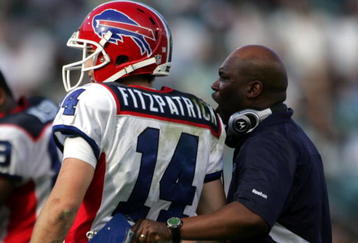 JACKSONVILLE, FL - NOVEMBER 22:  Head Coach Perry Fewell  and quarterback Ryan Fitzpatrick #14 of the Buffalo Bills watches his team  against the Jacksonville Jaguars at Jacksonville Municipal Stadium on November 22, 2009 in Jacksonville, Florida.  Jacksonville defeated Buffalo 18-15.  (Photo by Marc Serota/Getty Images)