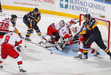 BUFFALO, NY - NOVEMBER 28: Michael Leighton #49  of the Carolina Hurricanes makes a pad save on a shot by Thomas Vanek #26 of the Buffalo Sabres  at HSBC Arena  on November 28, 2009 in Buffalo, New York.  (Photo by Rick Stewart/Getty Images)