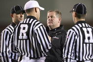 LOUISVILLE, KY - NOVEMBER 14: Head coach Brian Kelly of the Cincinnati Bearcats listens to referees during the Big East Conference game against the Louisville Cardinals on November 14, 2008 at Papa John's Stadium in Louisville, Kentucky. (Photo by Andy Lyons/Getty Images)