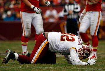 LANDOVER, MD - OCTOBER 18:  Albert Haynesworth #92 the Washington Redskins struggles to get off the field against the Kansas City Chiefs during their game October 18, 2009 at FedEx Field in Landover, Maryland. The Chiefs won the game 14-6.  (Photo by Win McNamee/Getty Images)