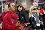 PALO ALTO, CA - NOVEMBER 21: Honorary Standford Cardinal captain Tiger Woods his daugher, Sam, and wife, Elin Nordegren, stand on the sidelines before the Cardinal game against the California Bears at Stanford Stadium on November 21, 2009 in Palo Alto, California. (Photo by Ezra Shaw/Getty Images)
