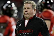 CINCINNATI - NOVEMBER 13:  Head coach Brian Kelly of the the Cincinnati Bearcats walks on the field during warm ups before the game against the West Virginia Mountaineers at Nippert Stadium on November 13, 2009 in Cincinnati, Ohio.  (Photo by Andy Lyons/Getty Images)