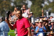 MELBOURNE, AUSTRALIA - NOVEMBER 15: Tiger Woods of the USA is applauded after victory on the 18th hole during the final round of the 2009 Australian Masters at Kingston Heath Golf Club on November 15, 2009 in Melbourne, Australia. (Photo by Scott Barbour/Getty Images)