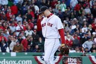BOSTON - OCTOBER 11: Pitcher Jonathan Papelbon #58 of the Boston Red Sox reacts after being taken out of the game after blowing a save in the ninth inning against the Los Angeles Angels of Anaheim in Game Three of the ALDS during the 2009 MLB Playoffs at Fenway Park on October 11, 2009 in Boston, Massachusetts. The Angels defeated the Red Sox 7-6. (Photo by Jim Rogash/Getty Images)
