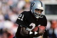 LOS ANGELES, CA - JANUARY 1:  Cliff Branch #21 of the Los Angeles Raiders runs the ball against Mel Blount #47 of the Pittsburgh Steelers during the AFC Divisional playoff game at the Los Angeles Memorial Coliseum on January 1, 1984 in Los Angeles, California.  The Raiders won 38-10. (Photo by George Rose/Getty Images)