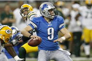 DETROIT , MI - NOVEMBER 26:  Matthew Stafford #9 of the Detroit Lions looks to throw a fourth quarter pass while playing the Green Bay Packers on November 26, 2009 at Ford Field in Detroit, Michigan. Green Bay won the game 34-12. (Photo by Gregory Shamus/Getty Images)
