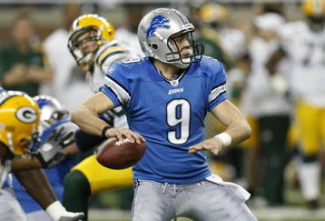 DETROIT , MI - NOVEMBER 26:  Matthew Stafford #9 of the Detroit Lions looks to throw a fourth quarter pass while playing the Green Bay Packers on November 26, 2009 at Ford Field in Detroit, Michigan. Green Bay won the game 34-12. (Photo by Gregory Shamus/Getty Images)