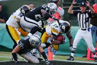 OAKLAND, CA - OCTOBER 29:  Willie Parker #39 of the Pittsburgh Steelers makes a touchdown reception against Michael Huff #24 of the Oakland Raiders during an NFL game at McAfee Coliseum October 29, 2006 in Oakland, California.  (Photo by Robert Laberge/Getty Images)