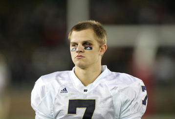 PALO ALTO, CA - NOVEMBER 28:  Jimmy Clausen #7 of the Notre Dame Fighting Irish walks the sidelines during their game against the Stanford Cardinal at Stanford Stadium on November 28, 2009 in Palo Alto, California.  (Photo by Ezra Shaw/Getty Images)