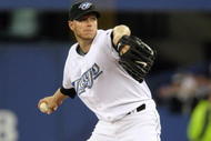 TORONTO - APRIL 6: Roy Halladay #32 of the Toronto Blue Jays delivers the pitch during the Opening Day game against the Detroit Tigers at the Rogers Centre on April 6, 2009 in Toronto, Ontario. (Photo by: Dave Sandford/Getty Images)