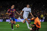 BARCELONA, SPAIN - NOVEMBER 29:  Xavier Hernandez (L) of FC Barcelona tries to score against Pepe and goalkeeper Iker Casillas (R) of Real Madrid during the La Liga match between Barcelona and Real Madrid at the Camp Nou Stadium on November 29, 2009 in Barcelona, Spain.  (Photo by Jasper Juinen/Getty Images)