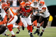 CINCINNATI - NOVEMBER 29:  Larry Johnson #27 of the Cincinnati Bengals runs with the ball during the NFL game against the Cleveland Browns at Paul Brown Stadium on November 29, 2009 in Cincinnati, Ohio.  (Photo by Andy Lyons/Getty Images)