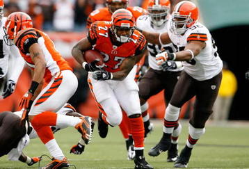 CINCINNATI - NOVEMBER 29:  Larry Johnson #27 of the Cincinnati Bengals runs with the ball during the NFL game against the Cleveland Browns at Paul Brown Stadium on November 29, 2009 in Cincinnati, Ohio.  (Photo by Andy Lyons/Getty Images)