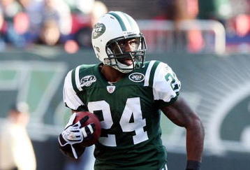 EAST RUTHERFORD, NJ - NOVEMBER 29:  Darrelle Revis #24 of the New York Jets runs the ball in for a first quarter touchdown after an interception against the Carolina Panthers on November 29, 2009 at Giants Stadium in East Rutherford, New Jersey.  (Photo by Jim McIsaac/Getty Images)