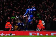 LONDON, ENGLAND - NOVEMBER 29:  Didier Drogba of Chelsea celebrates scoring his second goal during the Barclays Premier League match between Arsenal and Chelsea at the Emirates Stadium on November 29, 2009 in London, England.  (Photo by Mike Hewitt/Getty Images)