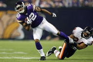 MINNEAPOLIS - NOVEMBER 29:  Percy Harvin #12 of the Minnesota Vikings breaks away from Al Afalava #24 of the Chicago Bears on November 29, 2009 at Hubert H. Humphrey Metrodome in Minneapolis, Minnesota.  (Photo by Elsa/Getty Images)