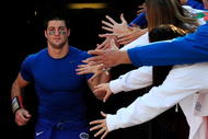 GAINESVILLE, FL - NOVEMBER 28: Tim Tebow #15 of the Florida Gators shakes hands with the fans prior to the game against the Florida State Seminoles at Ben Hill Griffin Stadium on November 28, 2009 in Gainesville, Florida. (Photo by Sam Greenwood/Getty Images)