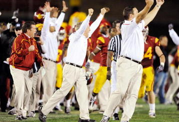 LOS ANGELES, CA - NOVEMBER 28:  Pete Carroll (C) of the USC Trojans celebrates after Damian Williams #18 wide receiver of the USC Trojans scored a 48-yard touchdown pass after UCLA Bruins called a time out with one minute remaining in the NCAA college football game at Los Angeles Memorial Coliseum on November 28, 2009 in Los Angeles, California.  (Photo by Kevork Djansezian/Getty Images)