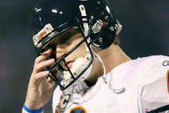 MINNEAPOLIS - NOVEMBER 29:  Jay Cutler #6 of the Chicago Bears walks off the field in the first half against the Minnesota Vikings on November 29, 2009 at Hubert H. Humphrey Metrodome in Minneapolis, Minnesota.  (Photo by Elsa/Getty Images)