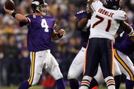 MINNEAPOLIS - NOVEMBER 29:  Brett Favre #4 of the Minnesota Vikings passes the ball under pressure from Israel Idonije #71 of the Chicago Bears on November 29, 2009 at Hubert H. Humphrey Metrodome in Minneapolis, Minnesota.  (Photo by Elsa/Getty Images)